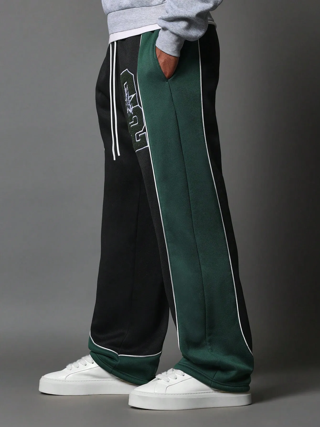 Wide Fit Drop Crotch Contrast Panel Sweatpants With Piping & Applique Badge Towelling
